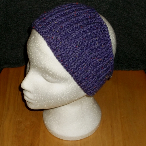 Purple coloured knitted headwear, handmade by Longhaired Jewels